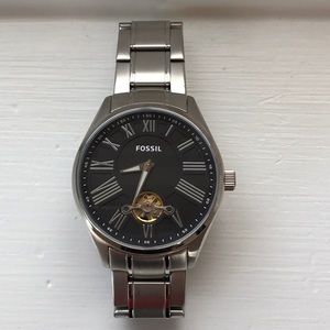 Men’s Fossil watch.